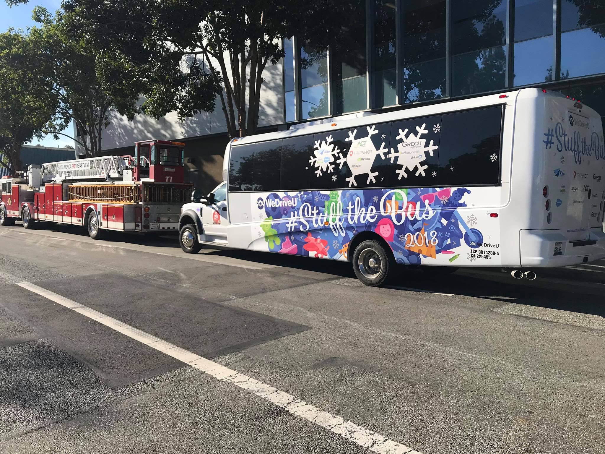 WeDriveU Stuff the Bus with Kite Pharma for Spark of Love with El Segundo Fire Department