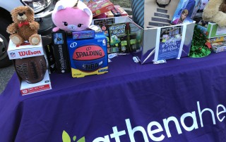 WeDriveU Stuff the Bus with athenahealth Watertown, MA for Whooley Foundation with Watertown Police Department and Fire Department