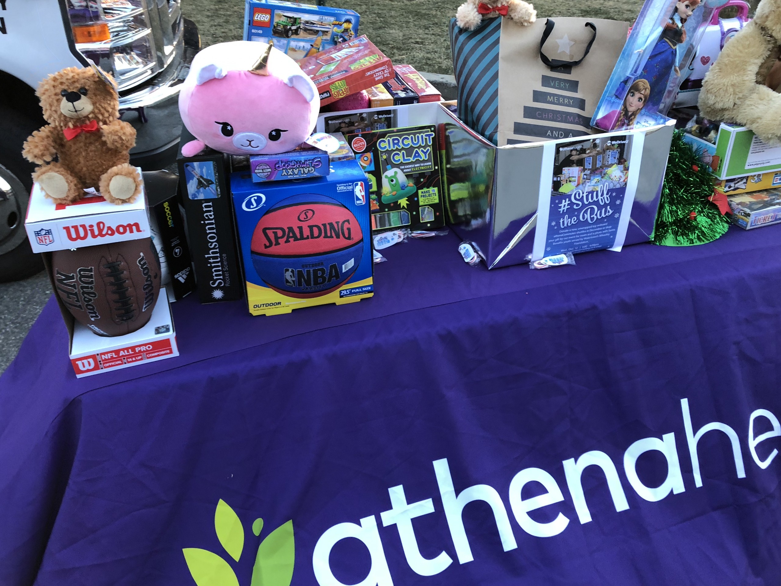 WeDriveU Stuff the Bus with athenahealth Watertown, MA for Whooley Foundation with Watertown Police Department and Fire Department