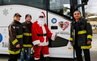 WeDriveU Stuff the Bus with SF Firefighters Toy Program at Burlingame, CA headquarters