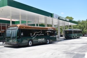 Image of Collier Area Transit bus in announcement about contract award to WeDriveU